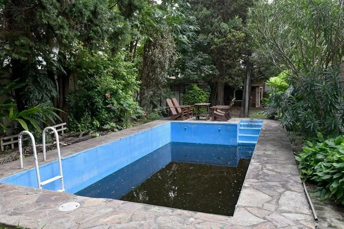 CASA EN VENTA CENTRO 4 DORMITORIOS PILETA PARQUE 2