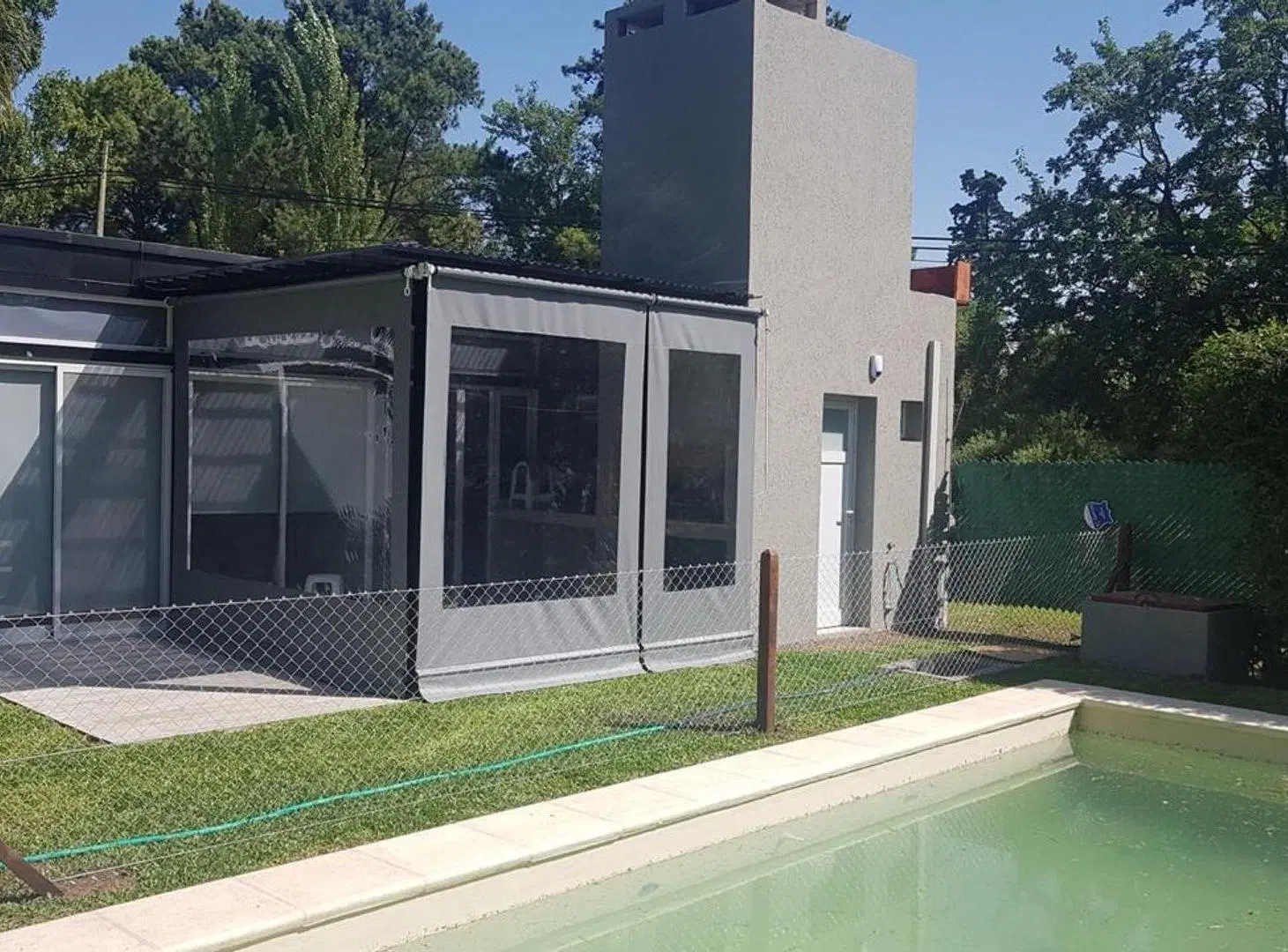 TERRENO EN VENTA EN FUNES CON QUINCHO Y PILETA 4