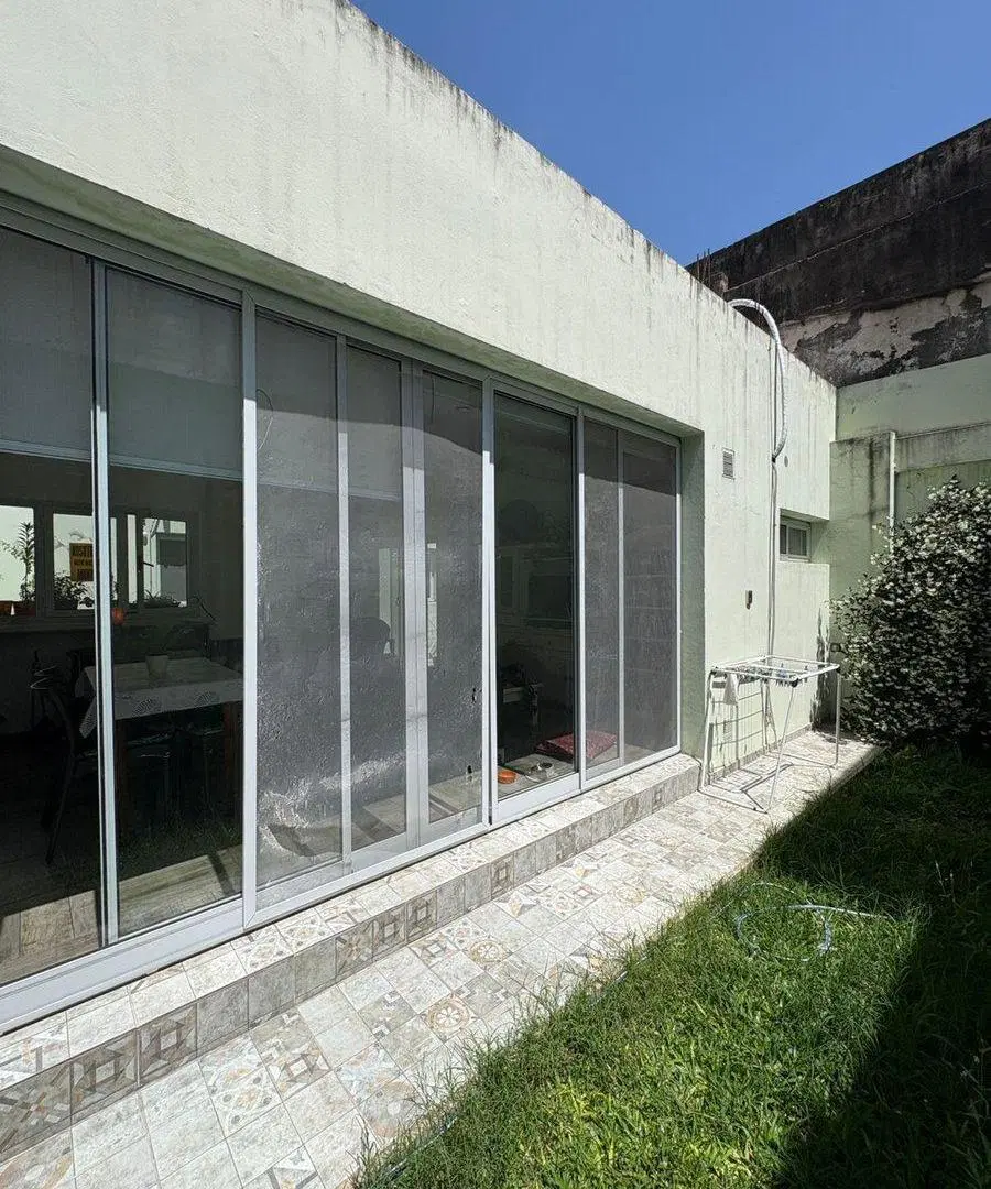 VENTA CASA DE PASILLO, DOS DORMITORIO, B° LA SEXTA 4