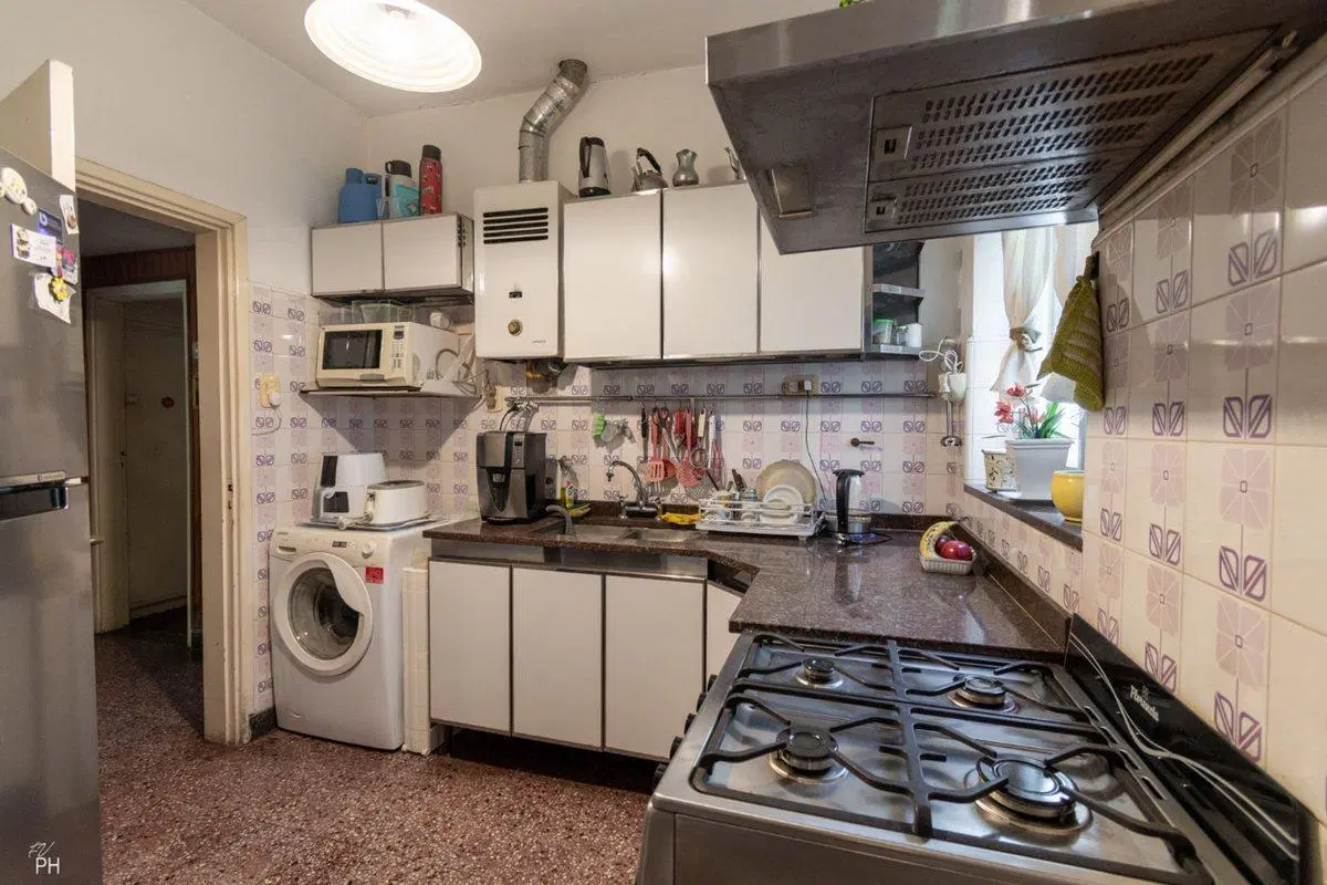 VENTA CASA-TRES DORMITORIOS CON JARDIN -TIRO SUIZO 5