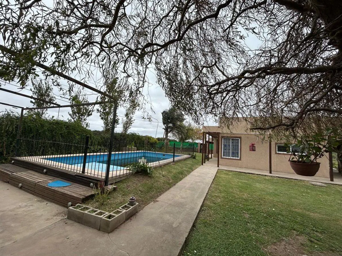 CASA VENTA CON PISCINA , PUNTA CHACRA, ROLDÁN 4