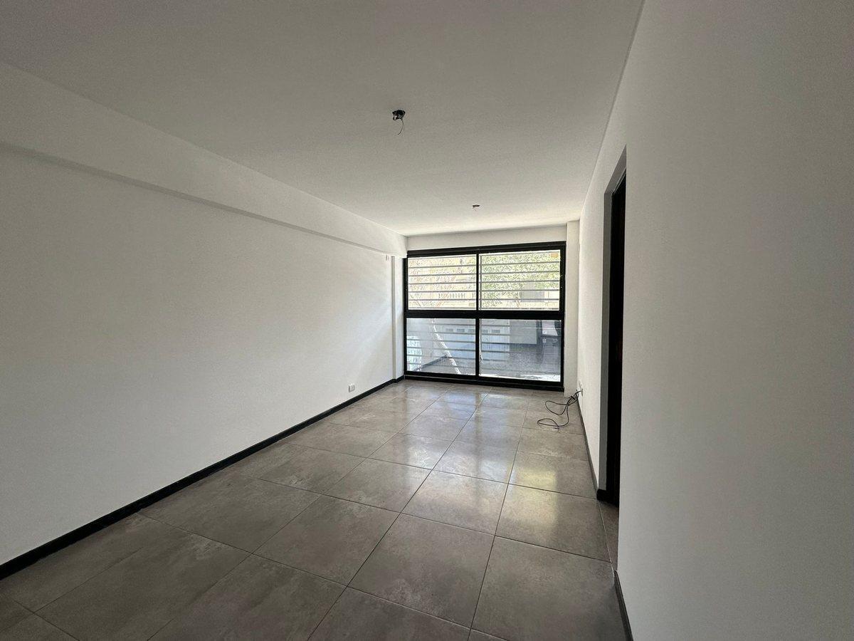 Foto de VENTA DEPARTAMENTO 1 DORMITORIO CON PATIO LOURDES, imagen 2