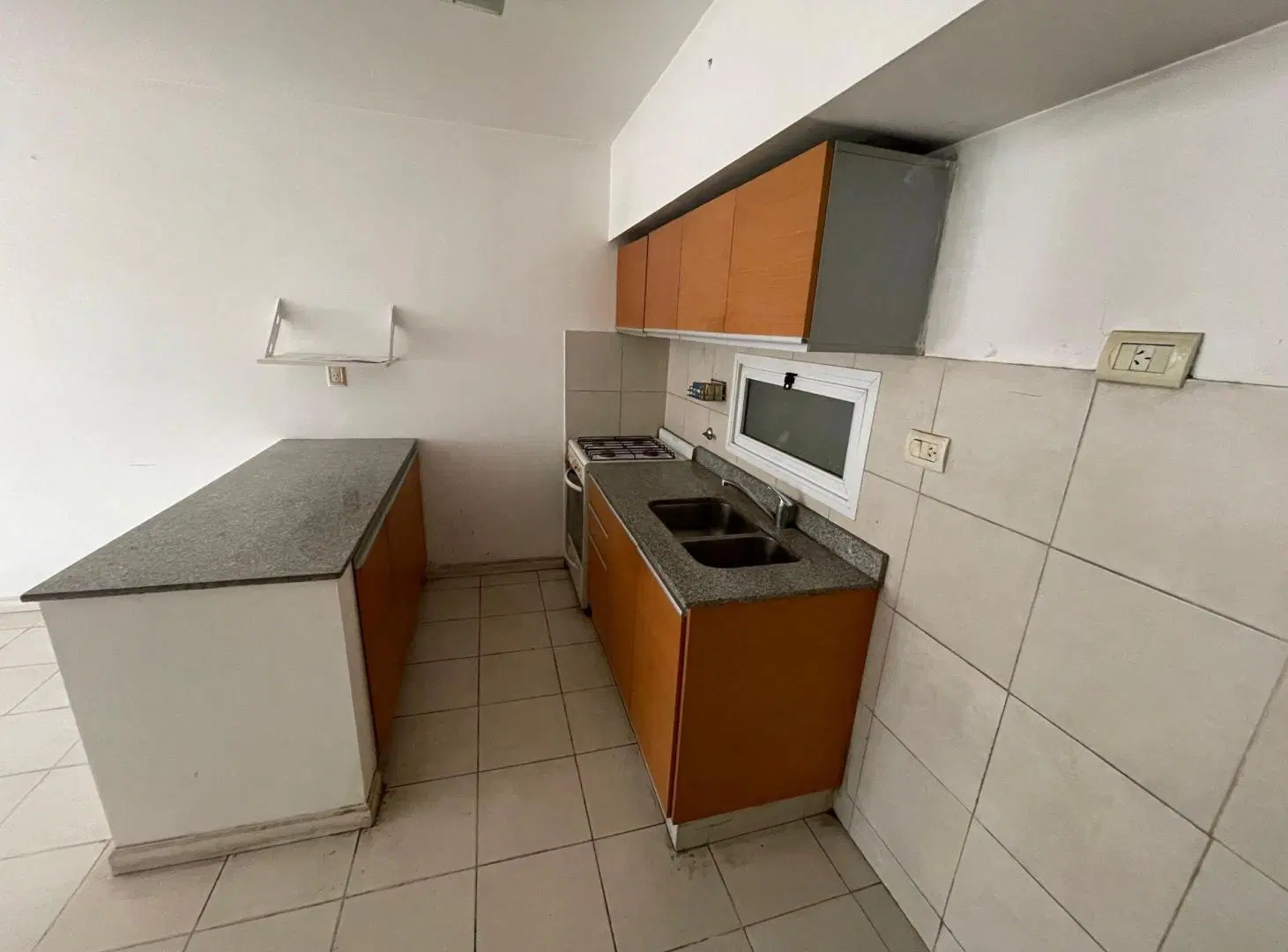 Venta Depto 1 dormitorio + cochera Pichincha 8