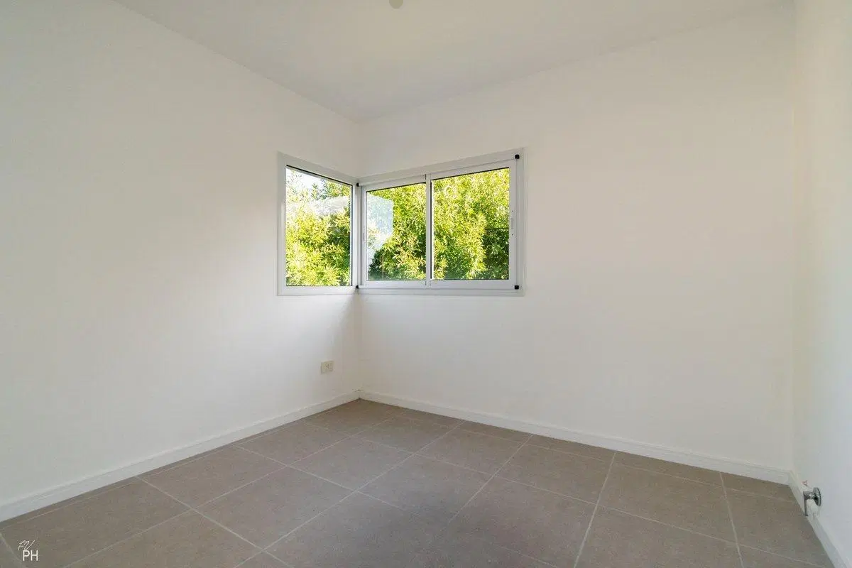 VENTA CASA 2 DORMITORIOS Y JARDÍN FUNES A ESTRENAR 5