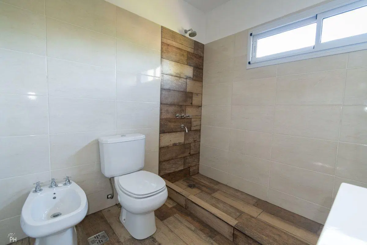 VENTA CASA 2 DORMITORIOS Y JARDÍN FUNES A ESTRENAR 8