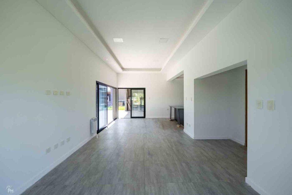 Foto de CASA EN VENTA 3 DORM PUERTO ROLDÁN, imagen 1