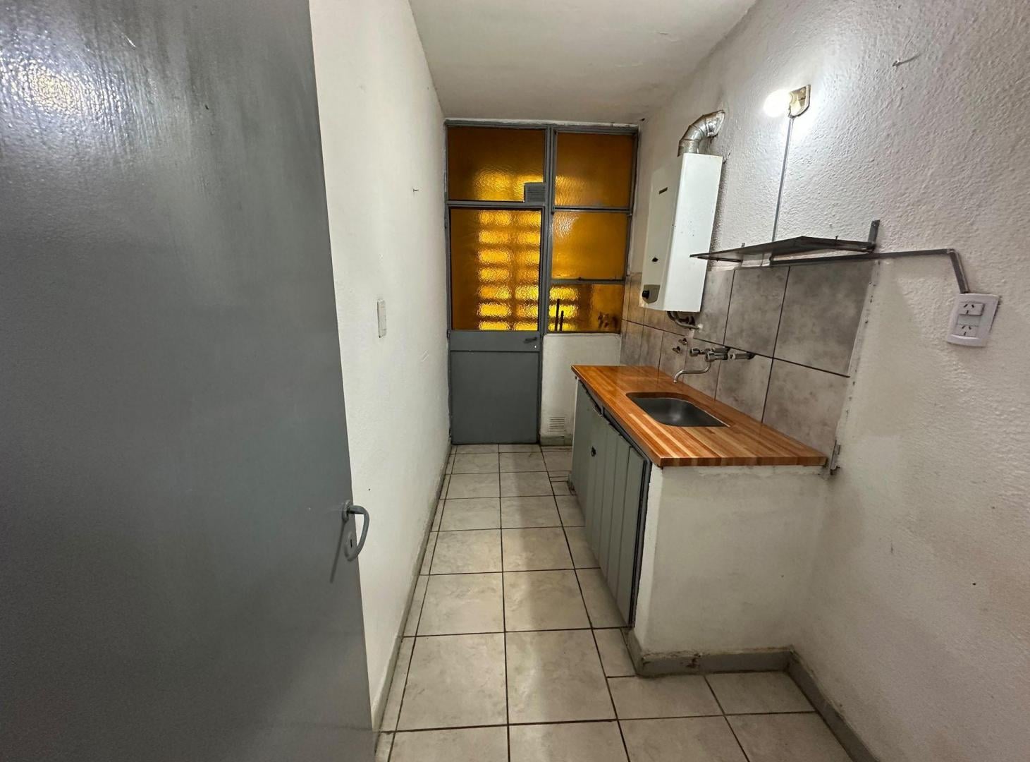 Foto de DEPARTAMENTO PB DE 2 DORMITORIOS EN BARRIO RUCCI, imagen 1