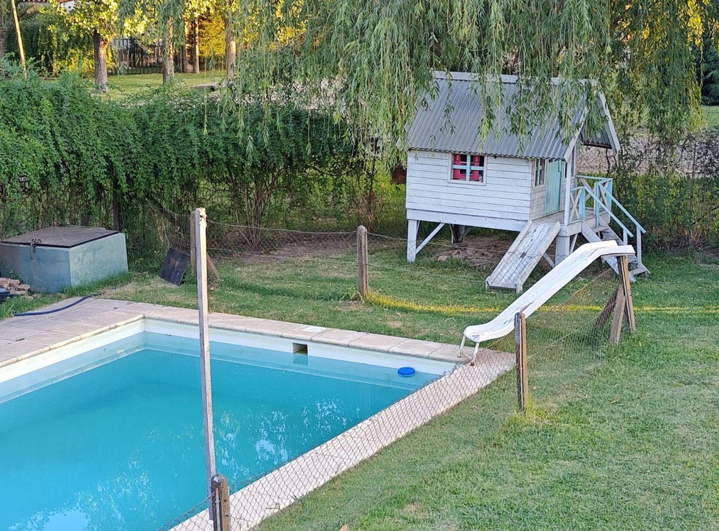 Foto de VENTA CASA FUNES DE 3 DORMITORIOS PARQUE Y PILETA, imagen 2