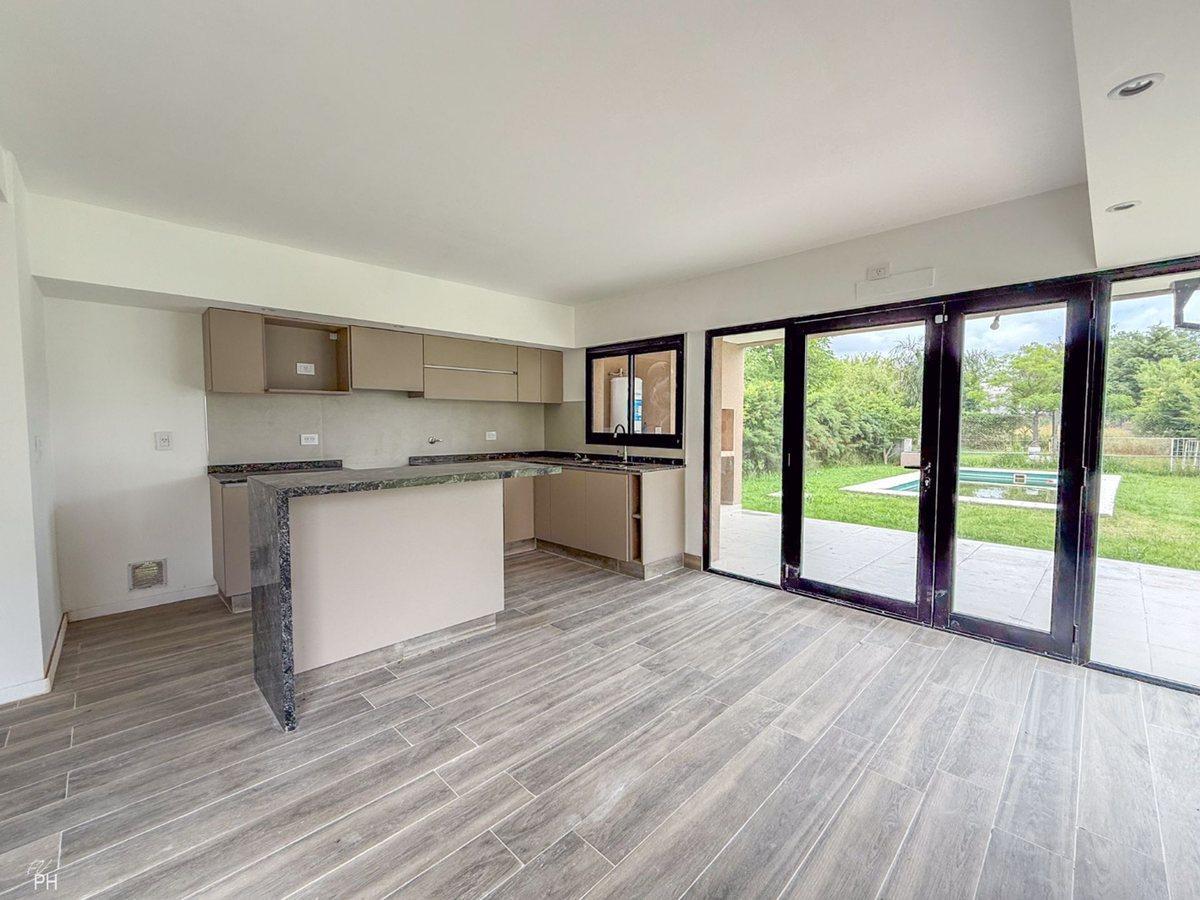 Foto de CASA EN VENTA 2 DORMITORIOS ROLDAN, imagen 2