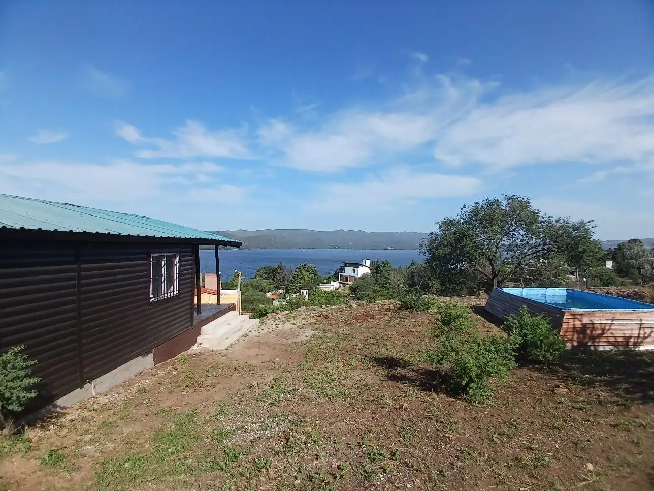 ALQUILER TEMPORAL CABAÑA PARA 4 PERSONAS - VISTA AL LAGO- ASADOR Y PIILETA - 2