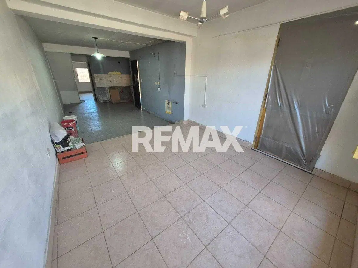 VENTA - CASA CON POTENCIAL COMERCIAL - CENTENARIO 3