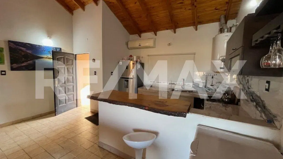 CASA EN VENTA 2 DORMOTORIOS PILETA LAGO PELLEGRINI 5