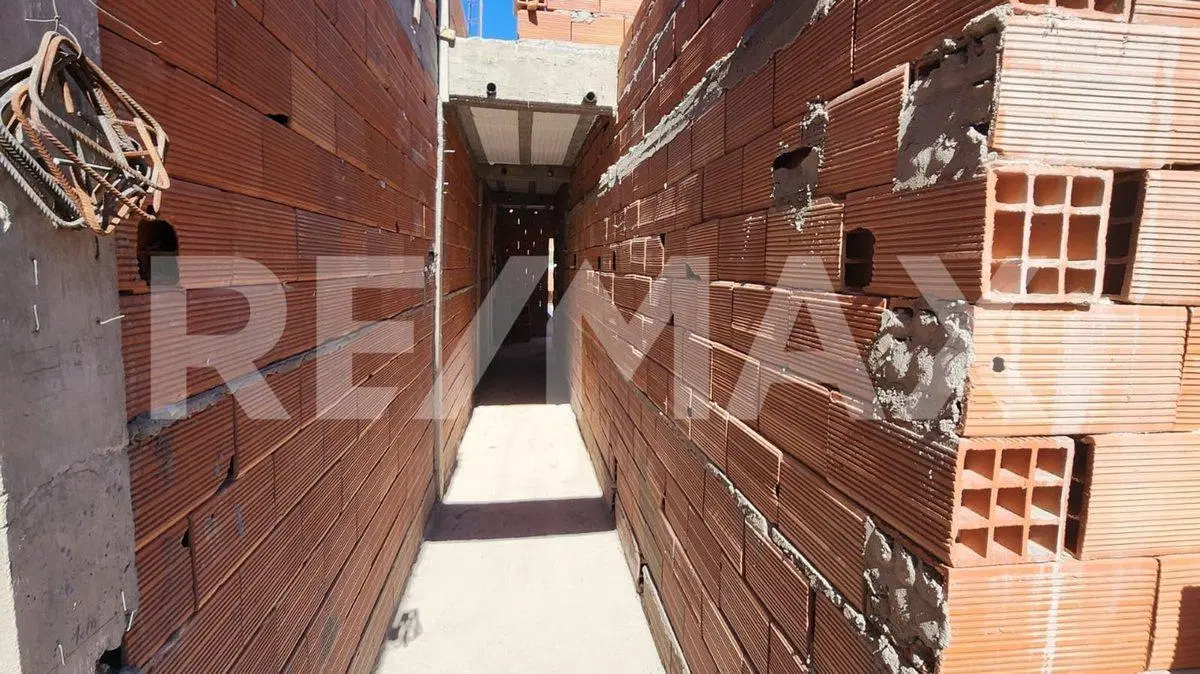 DPTO EN VENTA 2 DORMIS CON COCHERA| PLOTTIER 5