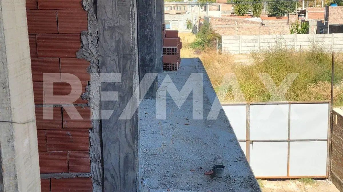 DPTO EN VENTA 2 DORMIS CON COCHERA| PLOTTIER 3