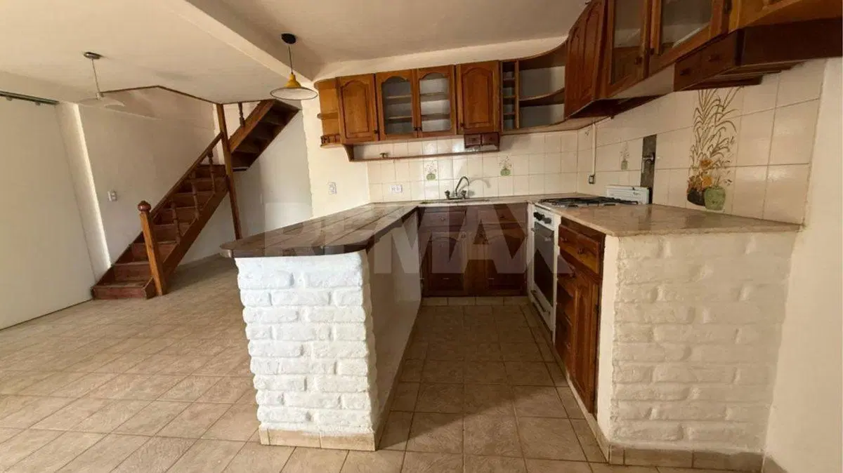 VENTA CASA CALLE RIO NEGRO 416 CENTENARIO 8