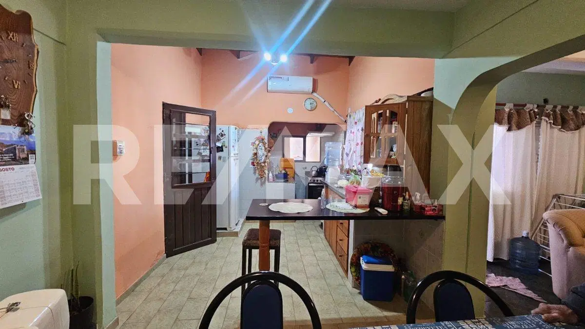 CASA 4 DORMITORIOS CON AMPLIACION EN CENTENARIO 3