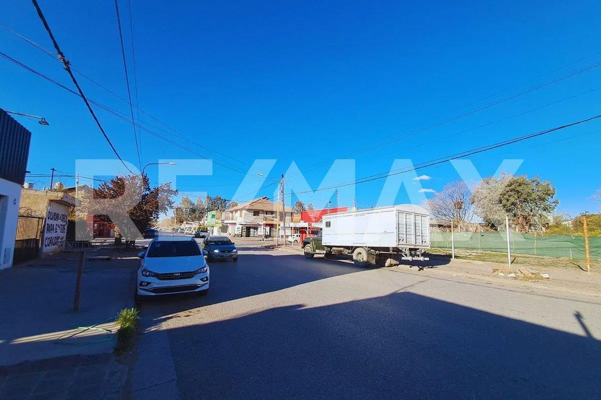Venta Local  y Terreno centro Centenario 400 m2 5