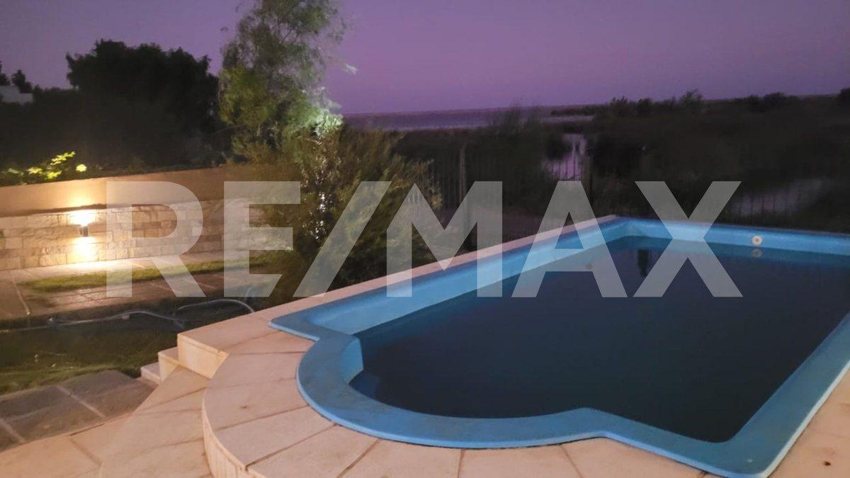 Foto de CASA EN VENTA 2 DORMOTORIOS PILETA LAGO PELLEGRINI, imagen 2