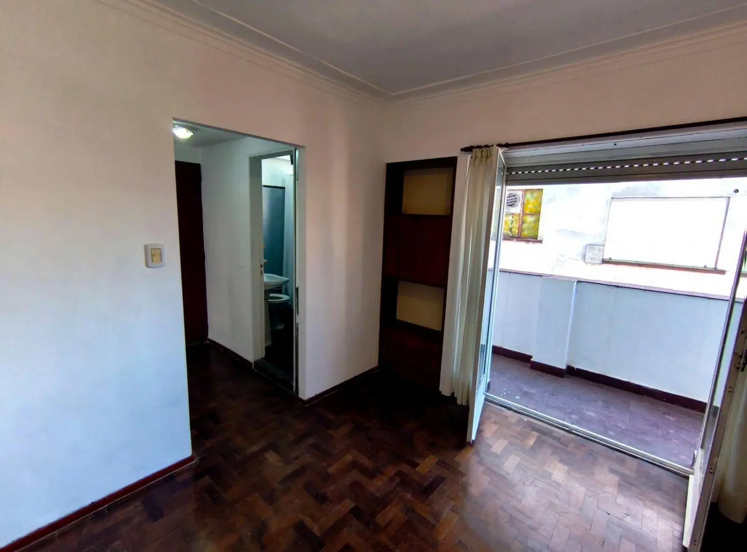 1 ambiente amplio con cocina y doble balcón 3
