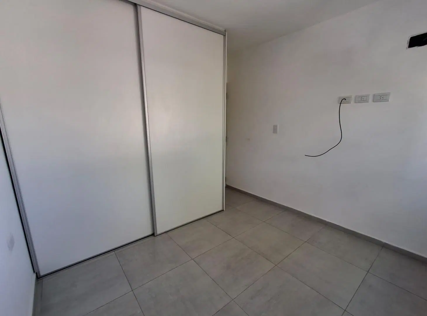 Alquiler Almafuerte al 1700 Rosario Departamento de un dormitorios de pasillo 3