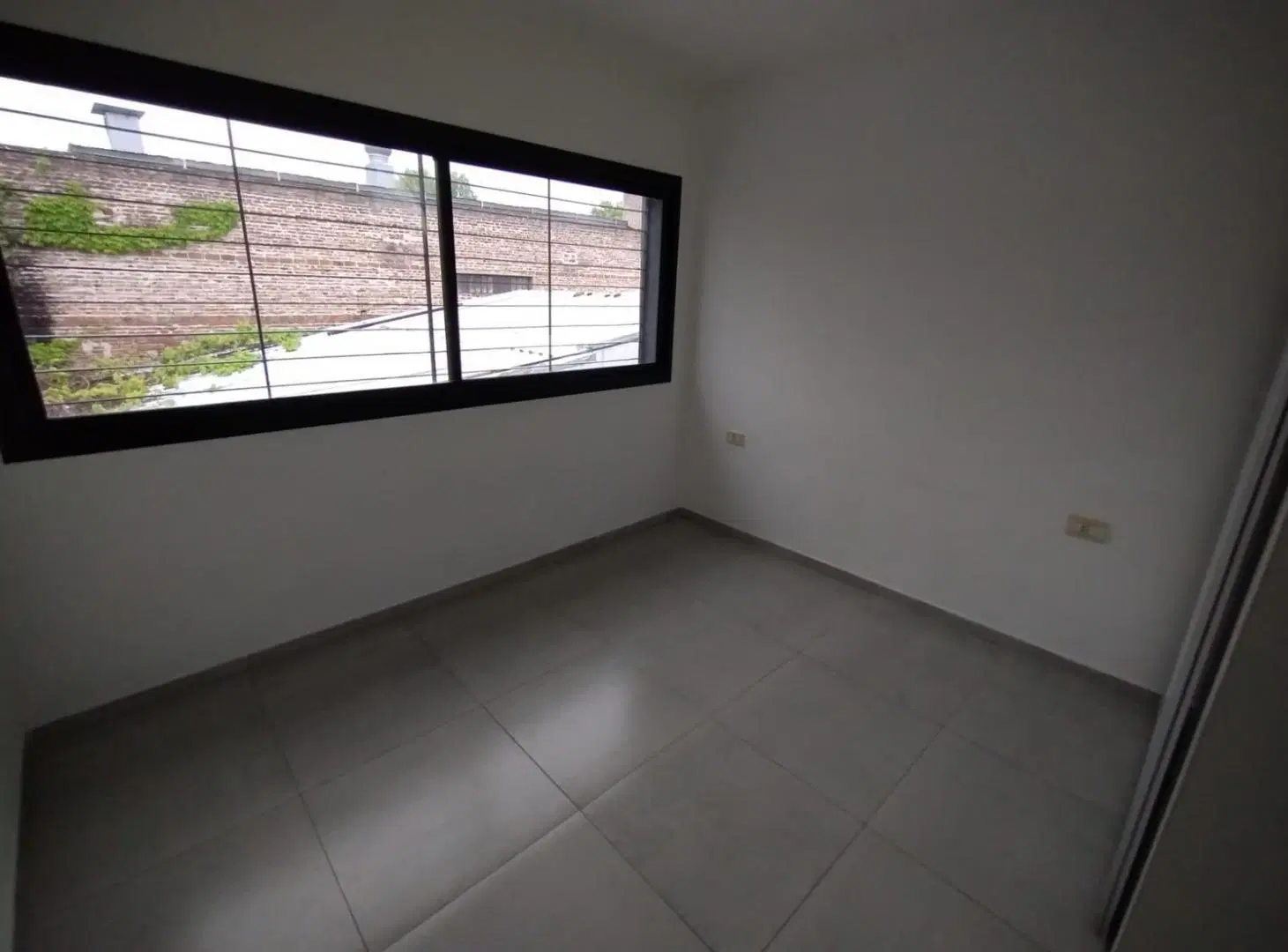 Alquiler Almafuerte al 1700 Rosario Departamento de un dormitorios de pasillo 5
