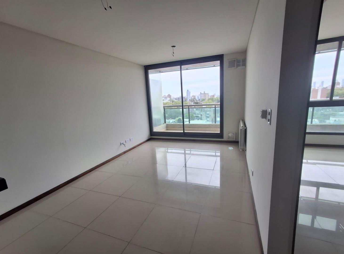 Foto de Departamento de un dormitorio con cochera Rosario, imagen 1