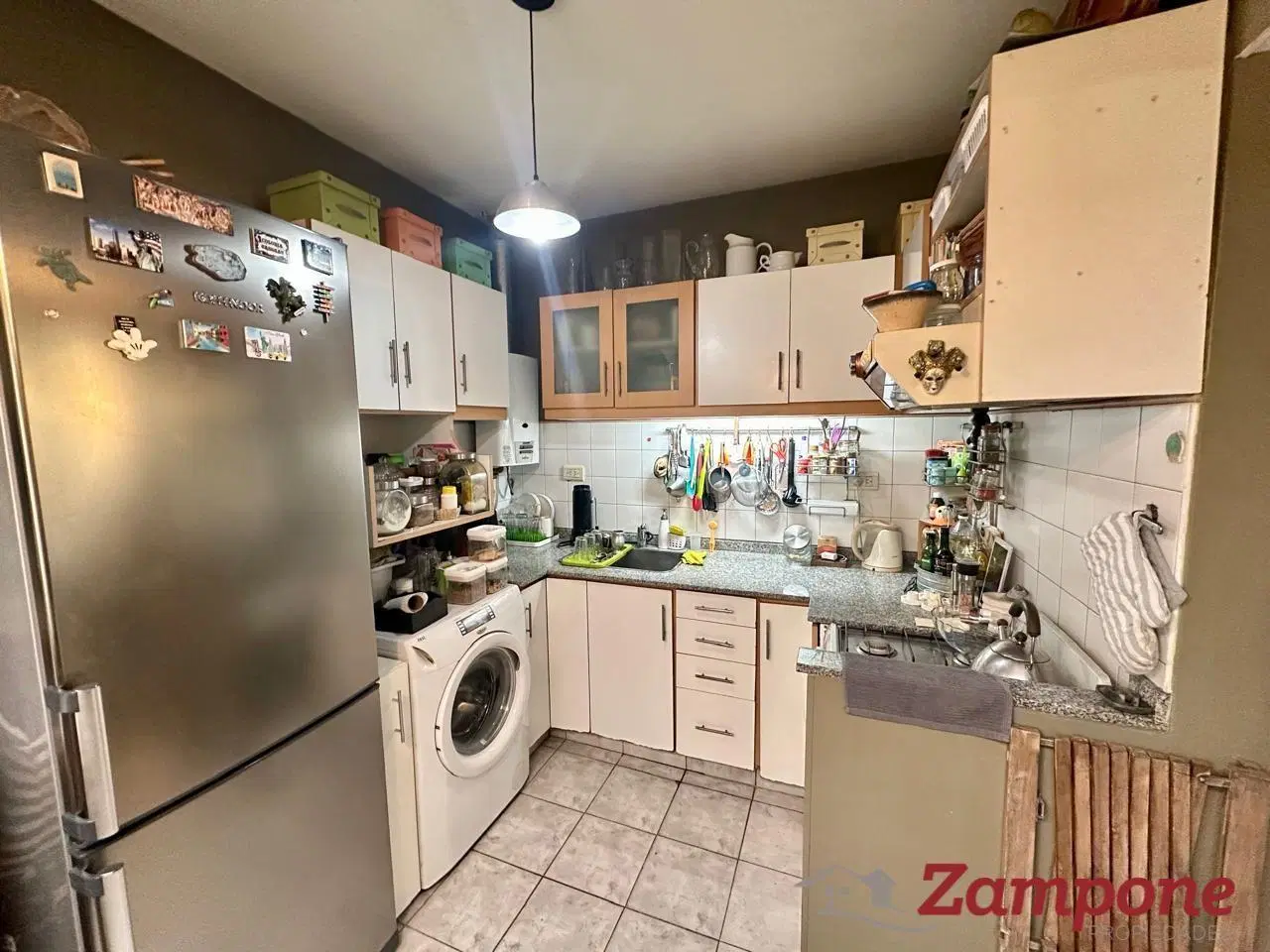 Venta de Duplex de 4 ambientes en condominio con cochera, patio y parrilla. 5