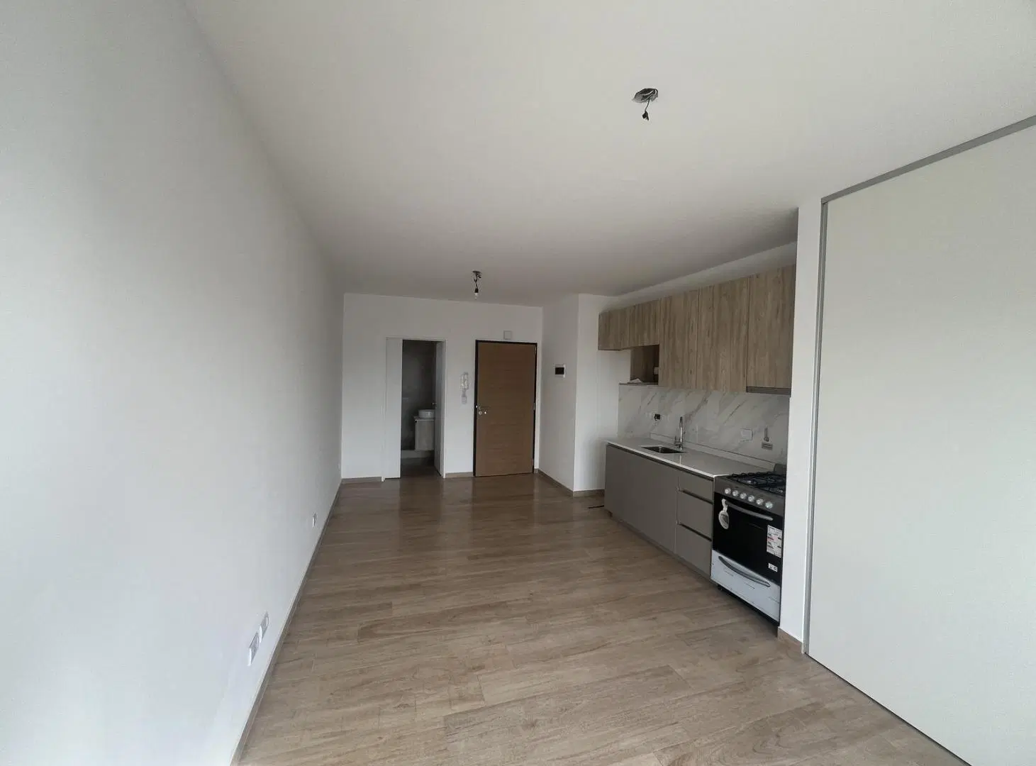 Departamento Monoambiente con Balcón y Vista abierta a Estrenar 8