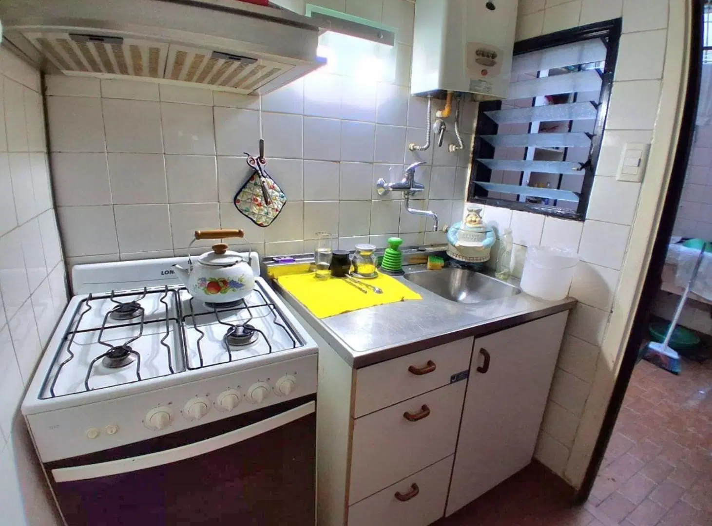 VENTA Departamento TRES AMBIENTES CON PATIO en Coghlan 4