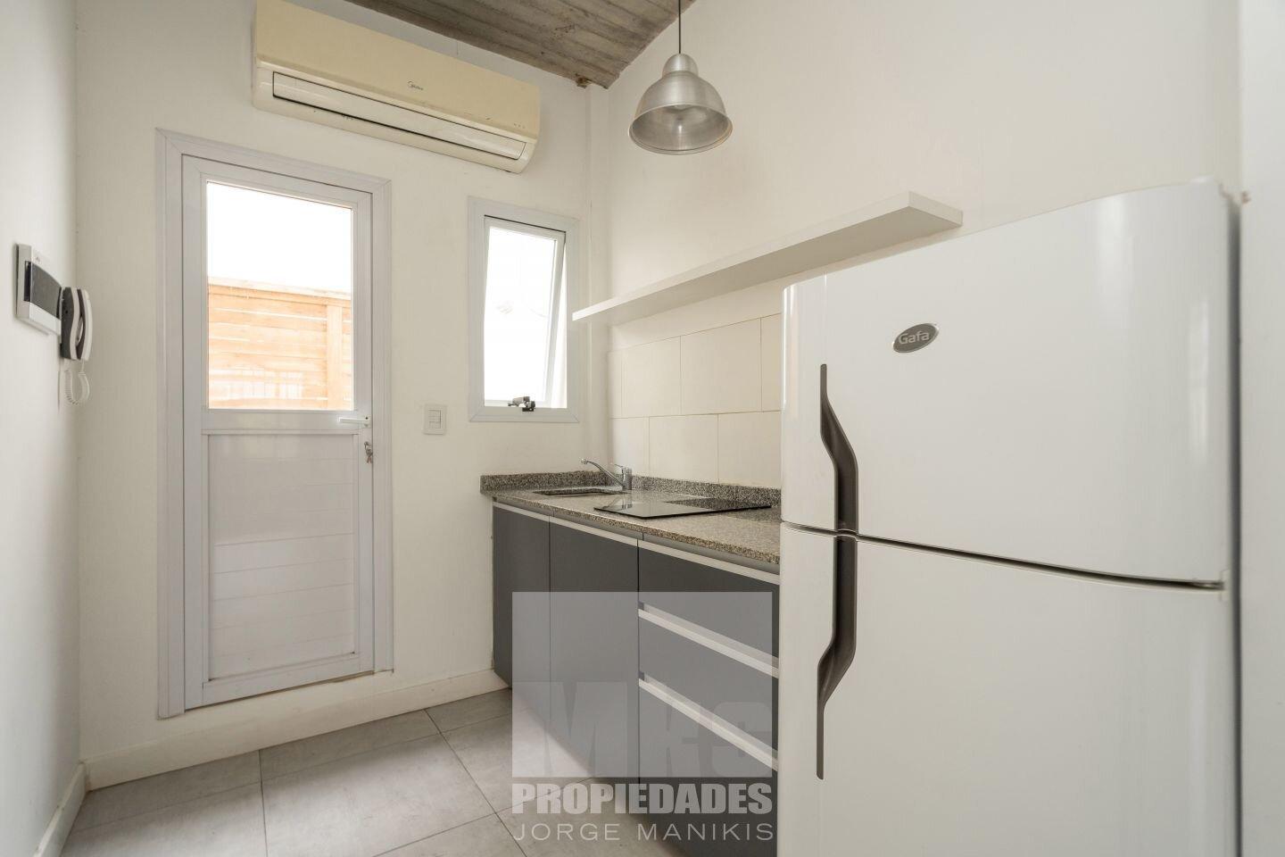 Foto de Venta con Renta. 9% anual en USD. PH Monoambiente con patio. Edificio, imagen 3