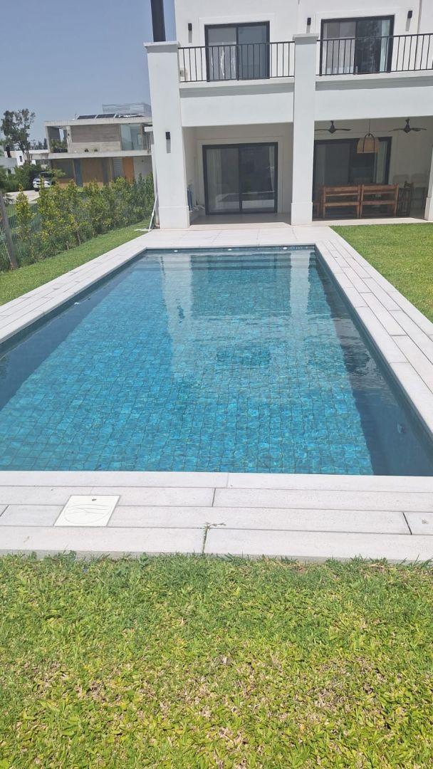 Foto de CASA EN ALQUILER MES DE ENERO + FIESTAS - 3 DORMITORIOS - BARRIO LAGUNA, imagen 4
