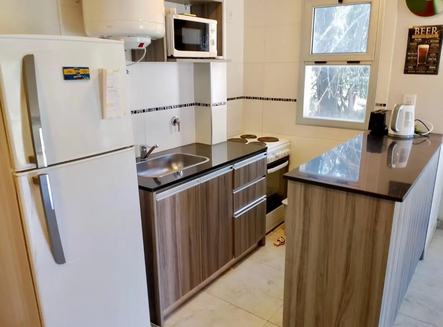 PINAMAR- TUYU UF10 CENTRICO DEPARTAMENTO  CON COCHERA 5
