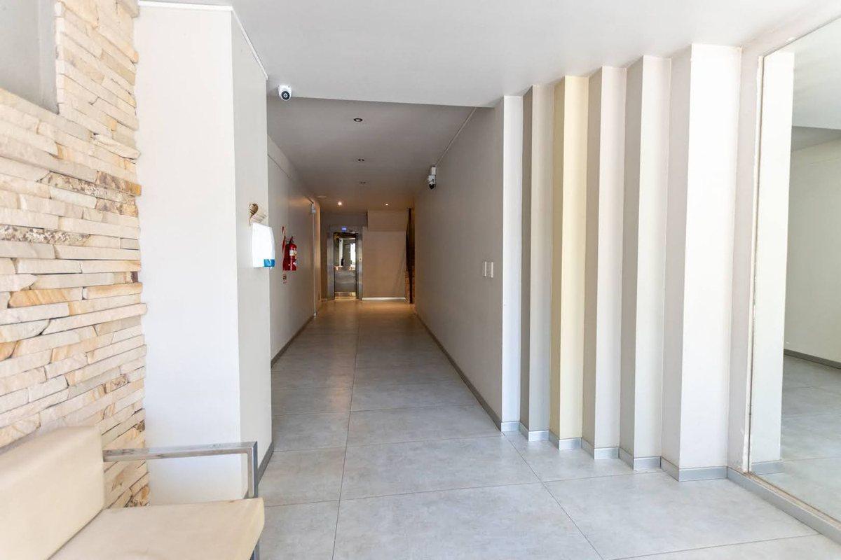 Foto de VENTA DEPARTAMENTO DE 1 DORMITORIO EN CAM DEL LAGO, imagen 2