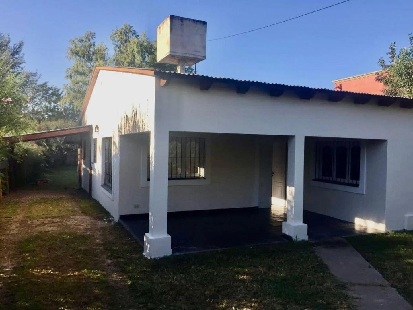 Foto de Muy linda casa 2 dor Vta gal/gge/jard cerca Tigres S.Lorenzo, imagen 2