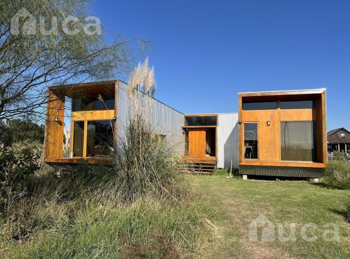 VENTA | CASA NUEVA de Increible Diseño en Magico entorno natural sobre Laguna 1