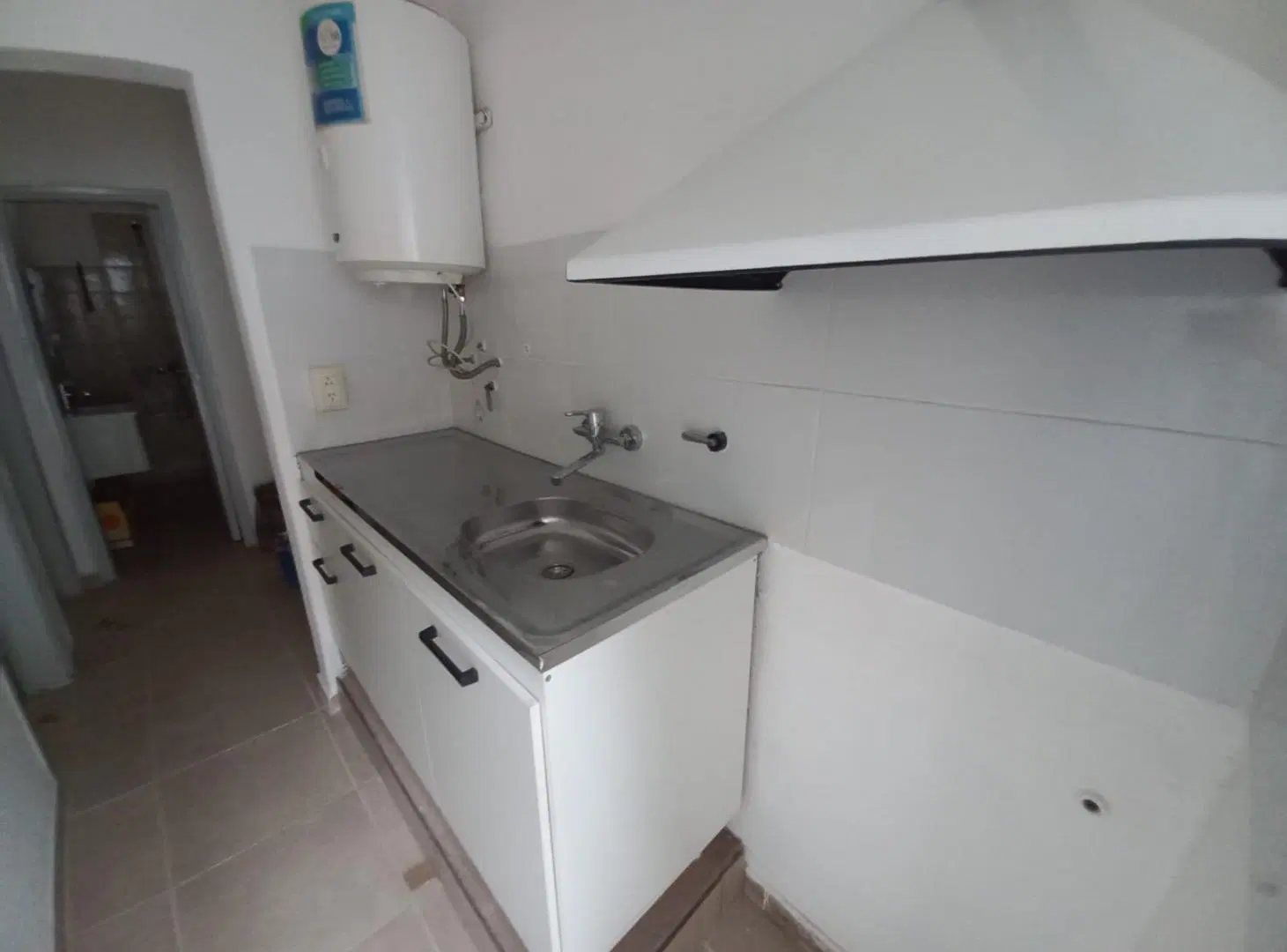 CASA INTERNA DE 1 DORMITORIO, LIVINGCOMEDOR, COCINA, PATIO Y ENTRADA DE VEHICULO 3