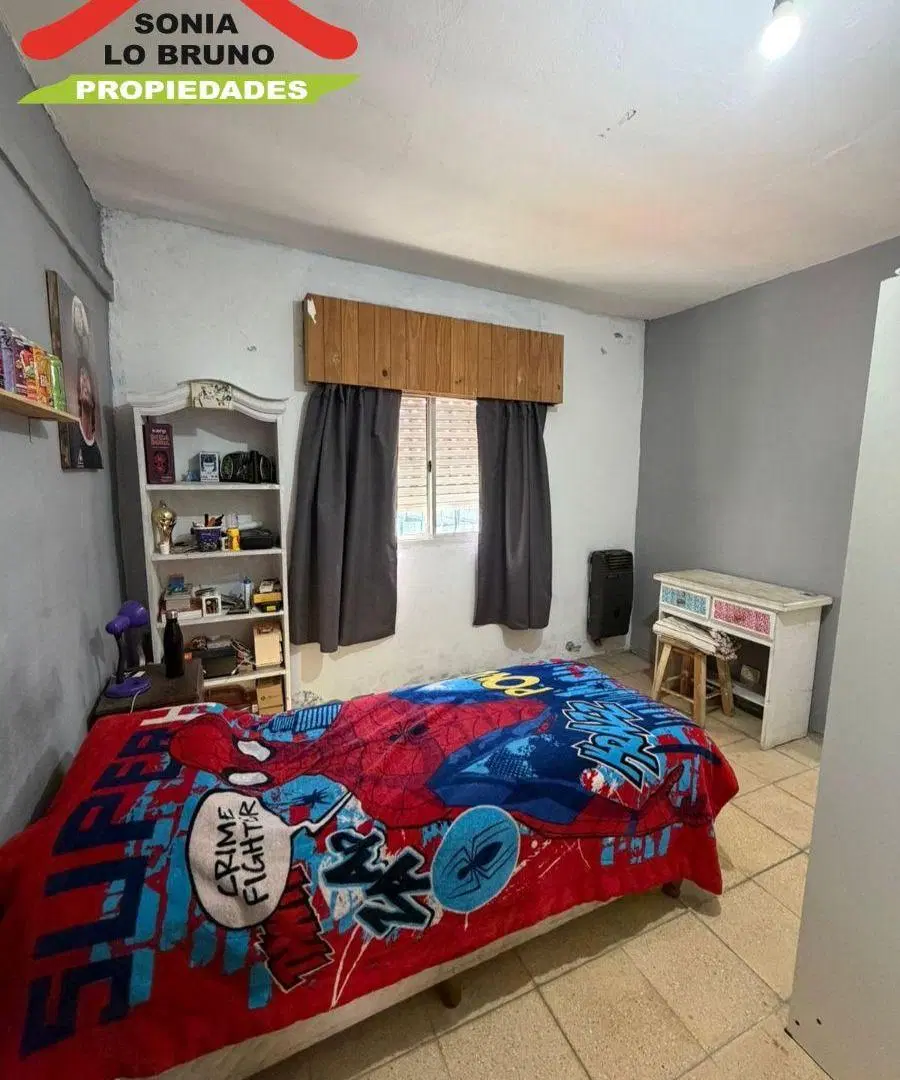 Casa en venta sobre lote de 420 m², ubicada en Paso del Rey norte, sobre calle Pío XII. 5