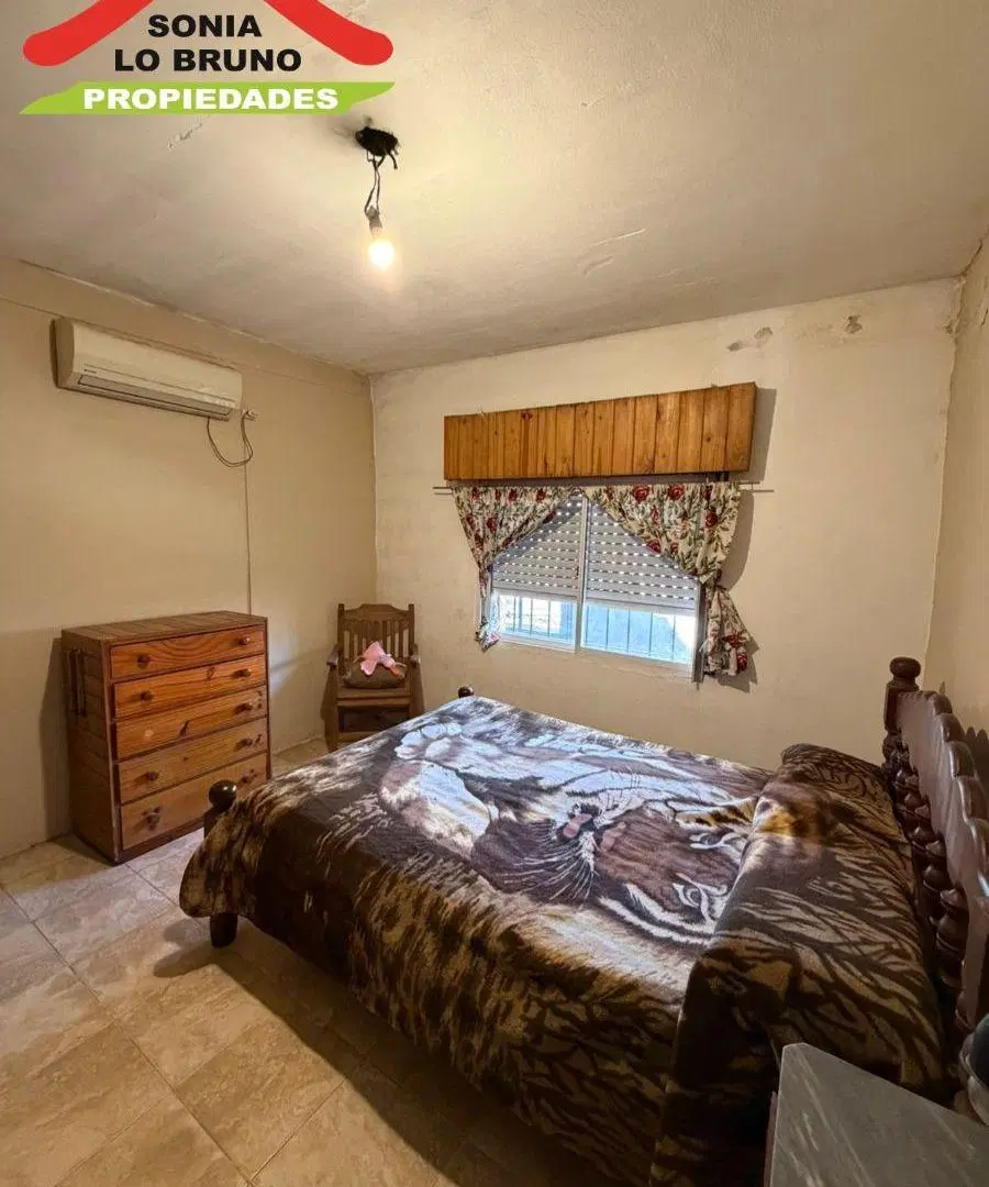 Casa en venta sobre lote de 420 m², ubicada en Paso del Rey norte, sobre calle Pío XII. 3