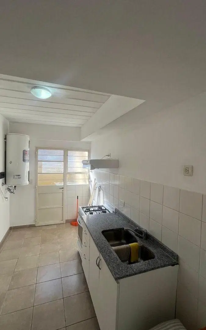 DEPARTAMENTO 2 AMBIENTES CON COCHERA Y JARDÍN EN BARRIO CERRADO HOGAR OBRERO. 8