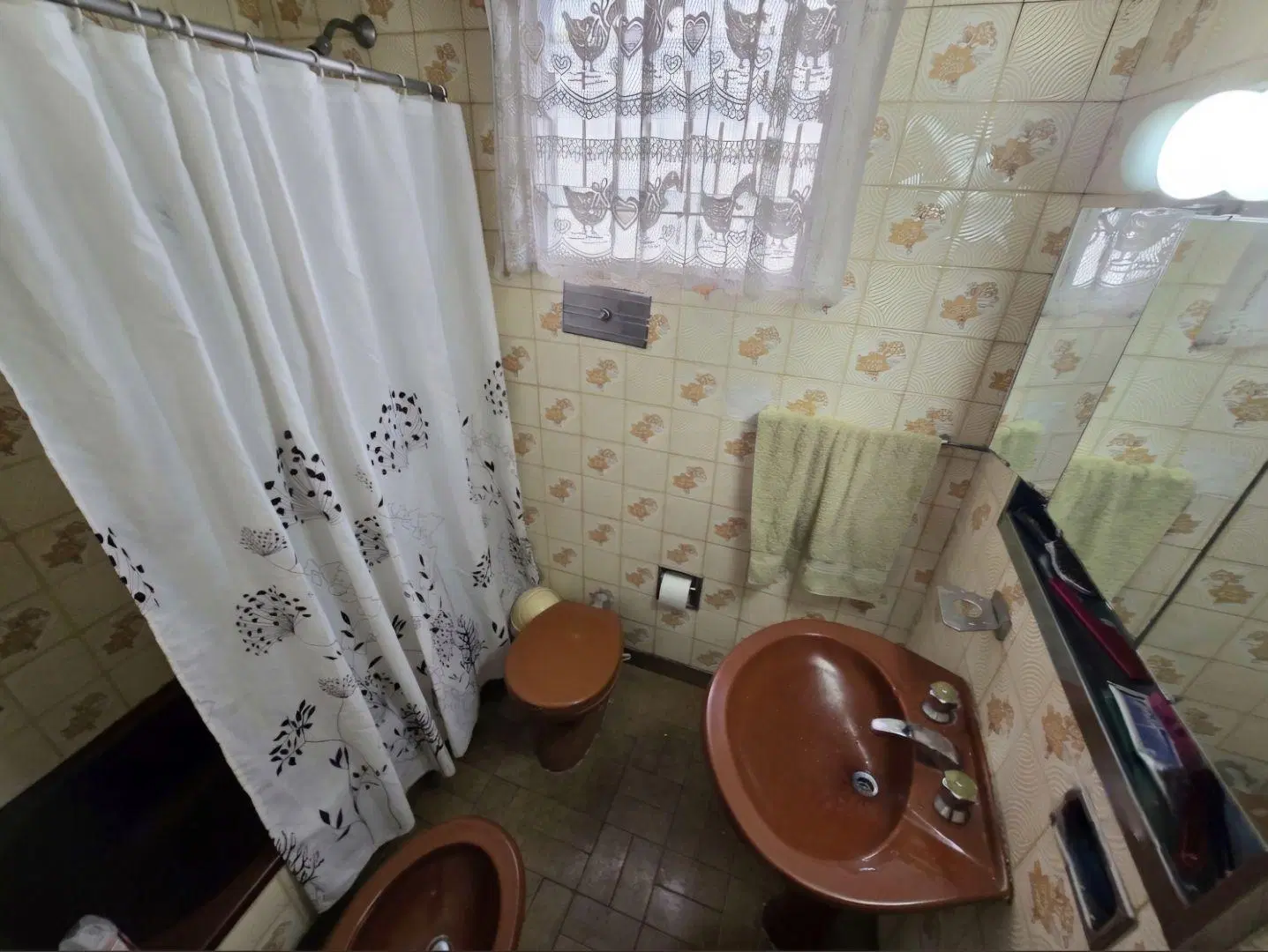 VENTA CASA DE 4 AMBIENTES, FONDO LIBRE, GARAGE, PARRILLA, RAMOS MEJIA 8