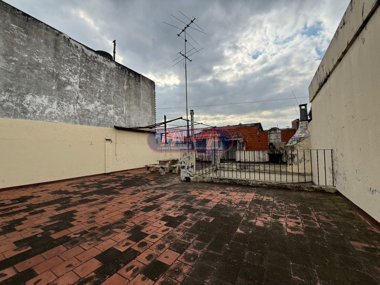 Foto de LOTE CON LOCAL, VIVIENDA, COCHERA Y TERRAZA VILLA LUGANO, imagen 1