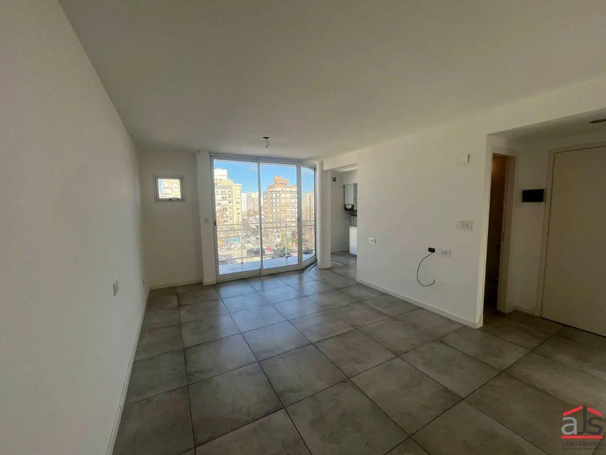 Moderno semipiso de 3 ambientes con cochera cubierta 1