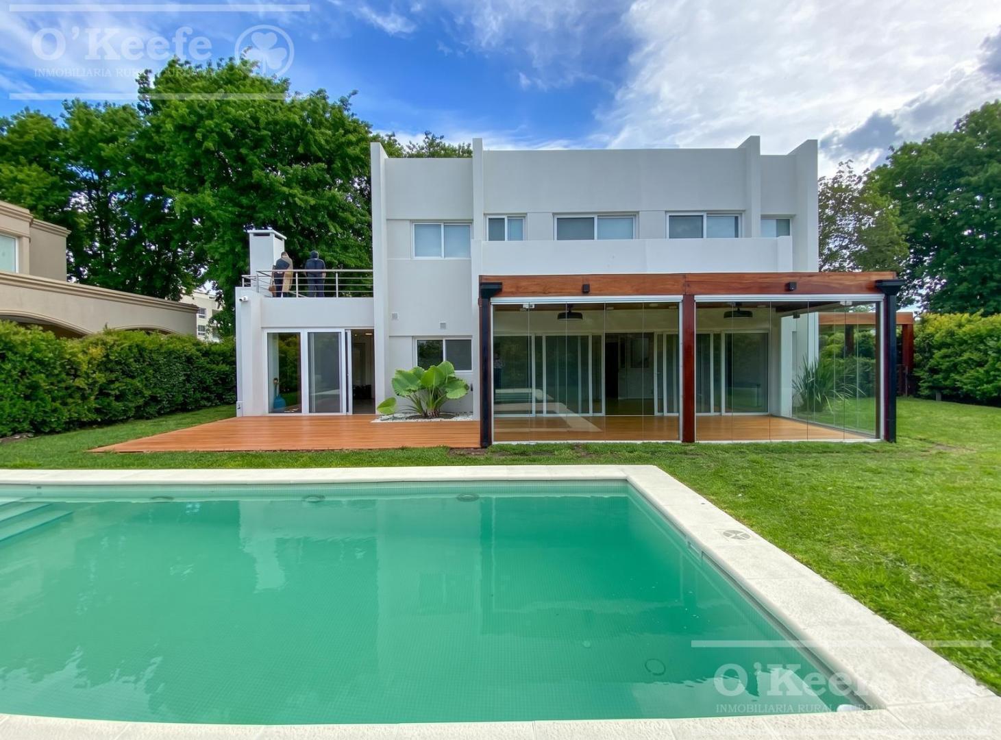 Foto de Casa en venta de 5 ambientes en Fincas de Hudson con piscina climatizada, imagen 4