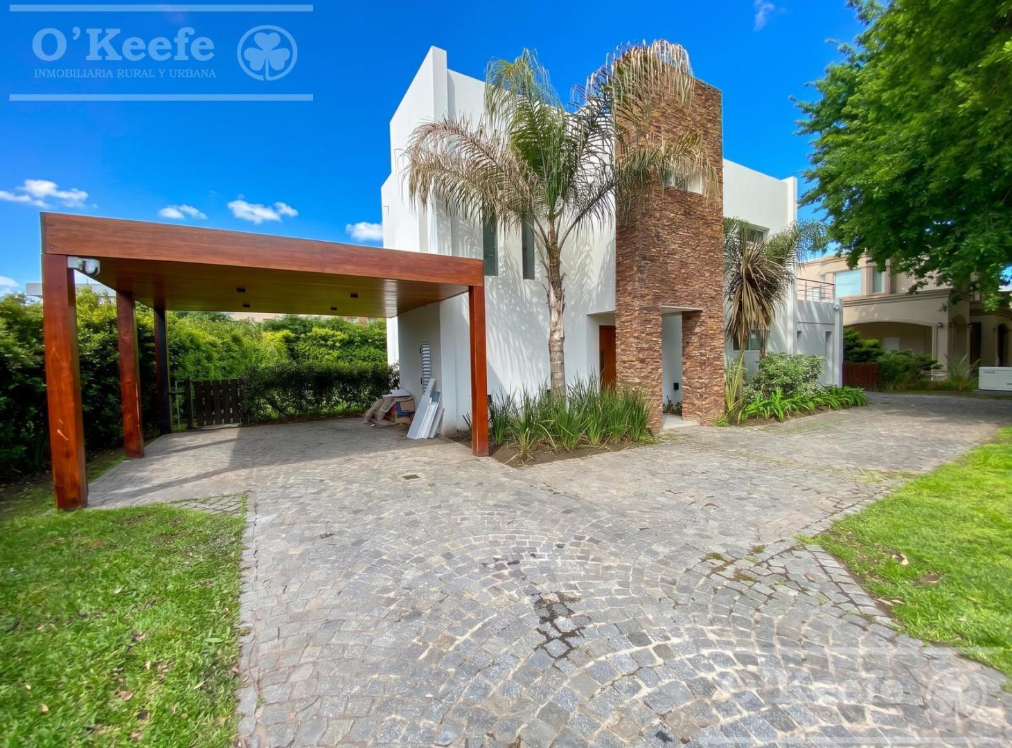 Foto de Casa en venta de 5 ambientes en Fincas de Hudson con piscina climatizada, imagen 2