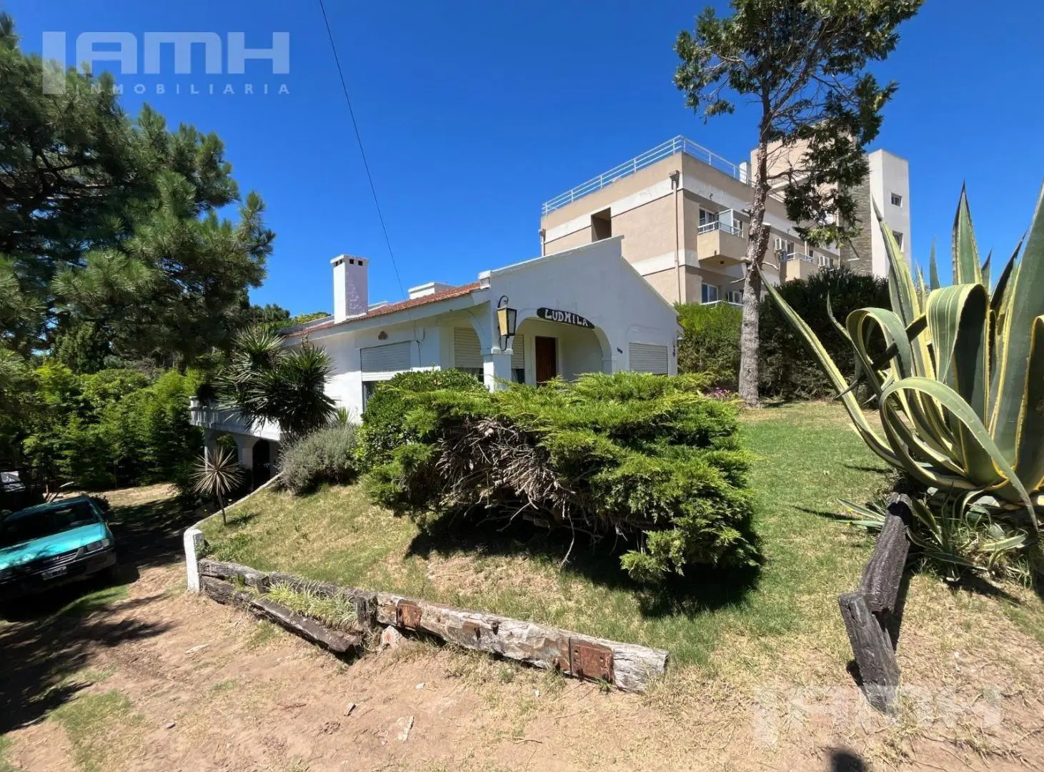 Lote multifamiliar con casa a demoler 2
