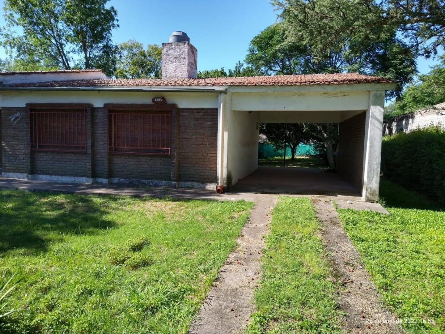 Foto de SE VENDE CASA 2 DORM, PATIO, COCHERA, 4 CUADRAS RIO COSQUIN., imagen 2