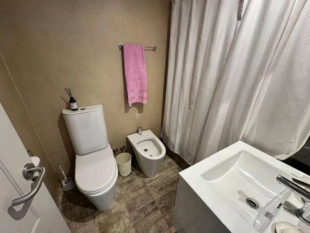 VENTA DPTO 3 AMBIENTES CON COCHERA BERNAL CENTRO 5