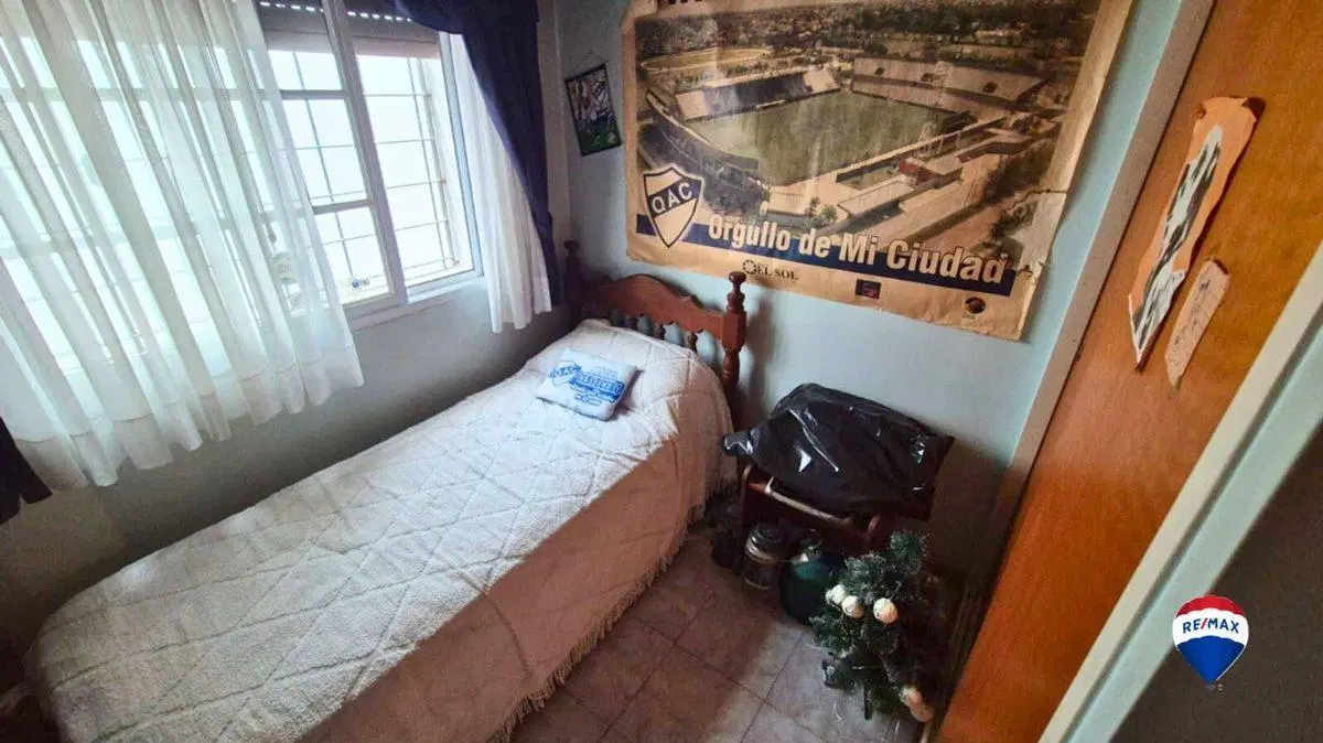 CASA 4 AMBIENTES CON GARAJE Y PATIO EN QUILMES 5