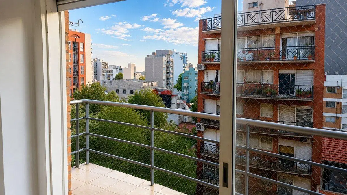 DEPARTAMENTO  EN VENTA DE 2 AMBIENTES CON COCHERA 5