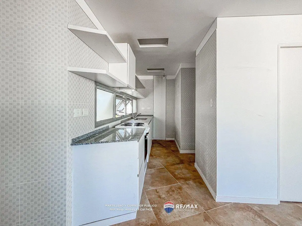 DEPARTAMENTO EN VENTA CON COCHERA  EN LA PLATA 4